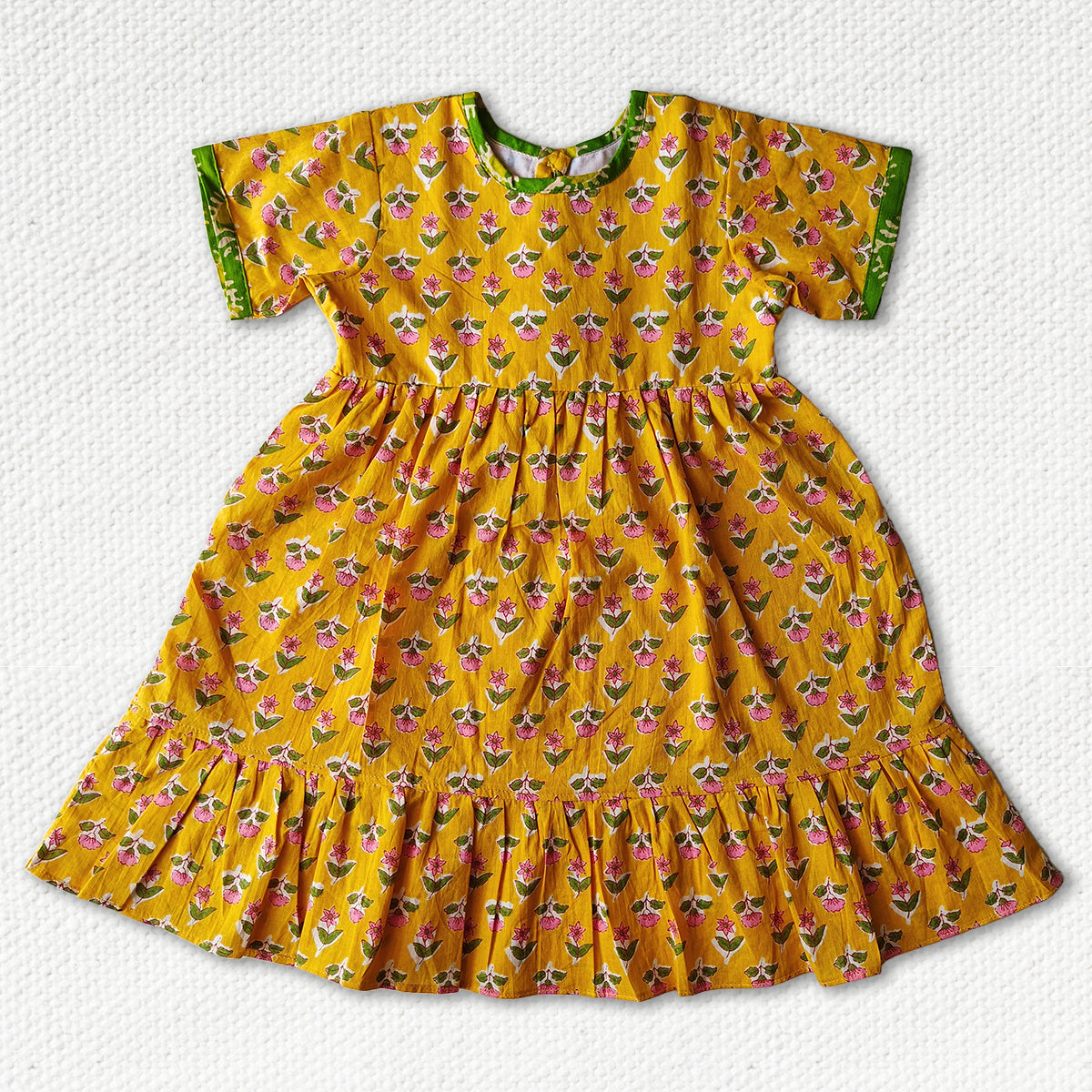 Fresh yellow Calf Length Frock With Green Border